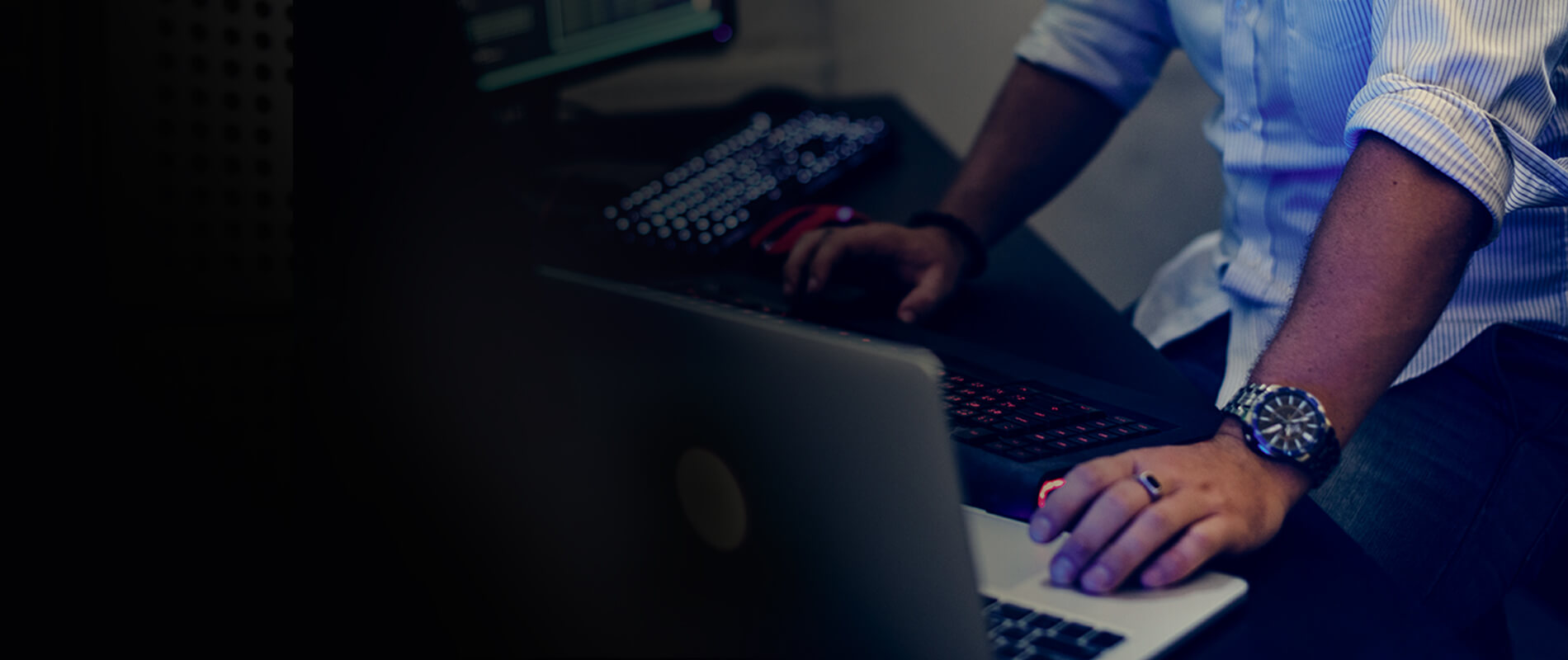 Man Working Virtually on Laptops