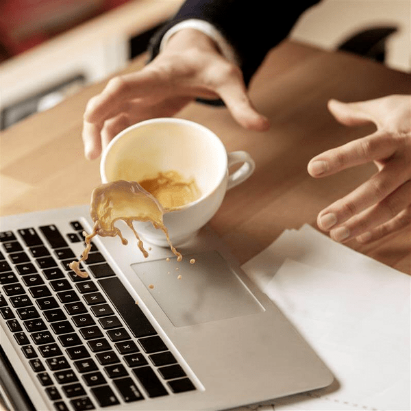 Coffee Spilled on Mac Laptop Coffee Spilled on Mac Laptop